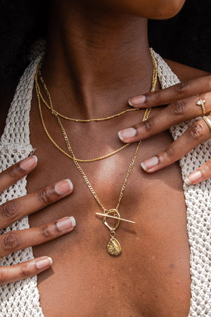 layered gold necklaces