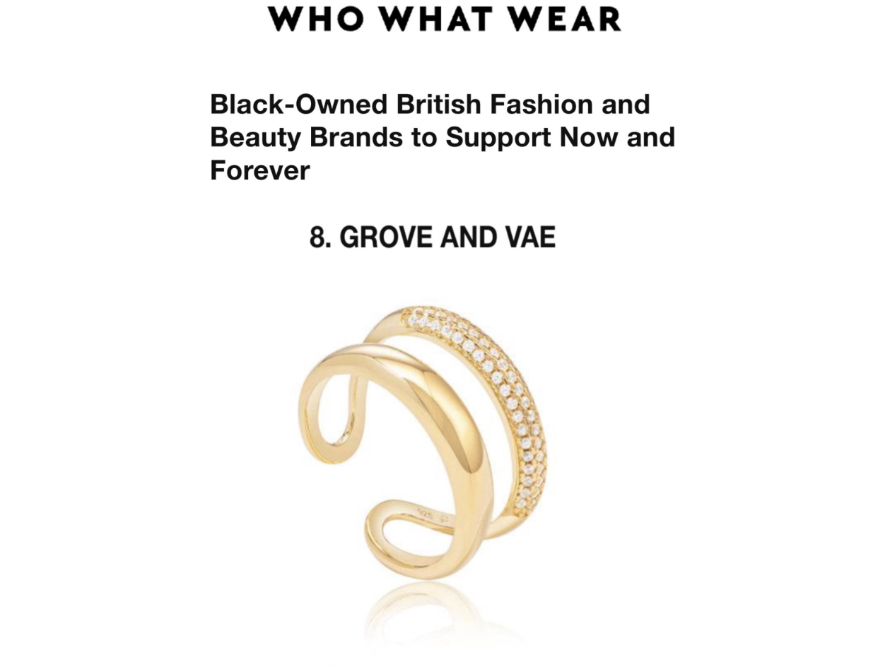 Gold ring with 'Grove and Vae' branding on a white background